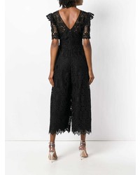 schwarzer Jumpsuit aus Spitze mit Rüschen von Temperley London