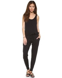 schwarzer Jumpsuit mit Ausschnitten von Feel The Piece