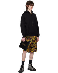 schwarzer Pullover mit einem Kapuze von Versace