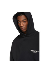 schwarzer Pullover mit einem Kapuze von Essentials