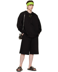 schwarzer Pullover mit einem Kapuze von Jean Paul Gaultier