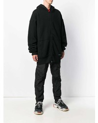 schwarzer Pullover mit einem Kapuze von Balenciaga