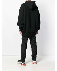 schwarzer Pullover mit einem Kapuze von Balenciaga