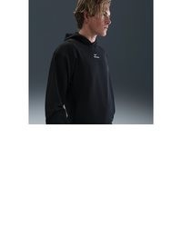 schwarzer Pullover mit einem Kapuze von Nike