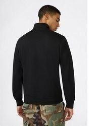schwarzer Pullover mit einem Reißverschluss am Kragen von Champion