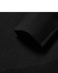 schwarzer Pullover mit einem Reißverschluss am Kragen von Sandro