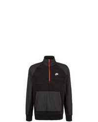 schwarzer Pullover mit einem Reißverschluss am Kragen von Nike Sportswear