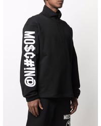 schwarzer Pullover mit einem Reißverschluss am Kragen von Moschino