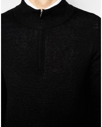 schwarzer Pullover mit einem Reißverschluss am Kragen von Benetton