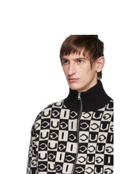 schwarzer Pullover mit einem Reißverschluß mit Karomuster von Gucci