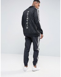 schwarzer Pullover mit einem Reißverschluß von adidas