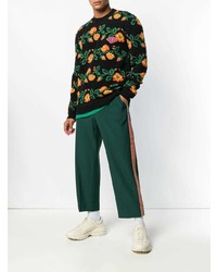 schwarzer Pullover mit einem Rundhalsausschnitt mit Blumenmuster von Gucci