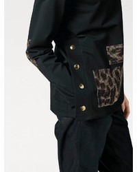 schwarzer Pullover mit einem Rundhalsausschnitt mit Leopardenmuster von RICK CARDONA by Heine