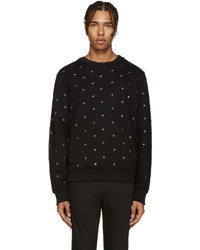schwarzer Pullover mit einem Rundhalsausschnitt mit Sternenmuster