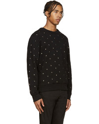 schwarzer Pullover mit einem Rundhalsausschnitt mit Sternenmuster von Diesel