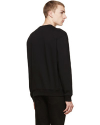 schwarzer Pullover mit einem Rundhalsausschnitt von McQ