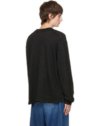 schwarzer Pullover mit einem Rundhalsausschnitt von Eytys