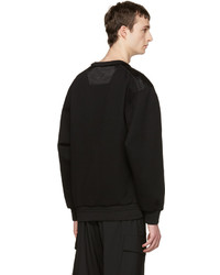 schwarzer Pullover mit einem Rundhalsausschnitt von Juun.J