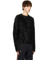 schwarzer Pullover mit einem Rundhalsausschnitt von Commission