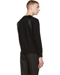 schwarzer Pullover mit einem Rundhalsausschnitt von Alexander McQueen