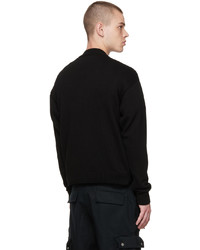 schwarzer Pullover mit einem Rundhalsausschnitt von Reese Cooper® 