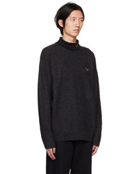 schwarzer Pullover mit einem Rundhalsausschnitt von Fred Perry