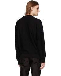 schwarzer Pullover mit einem Rundhalsausschnitt von Versace