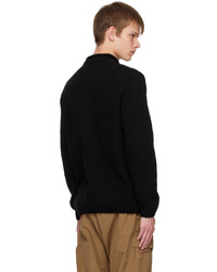 schwarzer Pullover mit einem Rundhalsausschnitt von C.P. Company