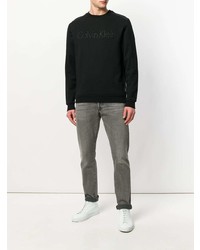 schwarzer Pullover mit einem Rundhalsausschnitt von Calvin Klein Jeans