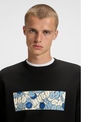 schwarzer Pullover mit einem Rundhalsausschnitt von HUGO Blue