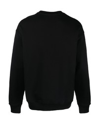 schwarzer Pullover mit einem Rundhalsausschnitt von Moschino