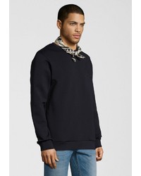 schwarzer Pullover mit einem Rundhalsausschnitt von Scotch & Soda