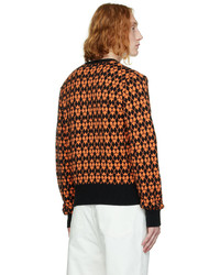 schwarzer Pullover mit einem V-Ausschnitt mit Argyle-Muster von AMI Alexandre Mattiussi