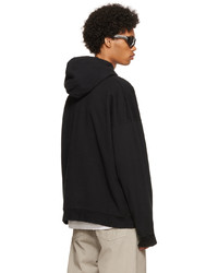 schwarzer und weißer bedruckter Pullover mit einem Kapuze von Balenciaga