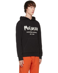 schwarzer und weißer bedruckter Pullover mit einem Kapuze von Alexander McQueen