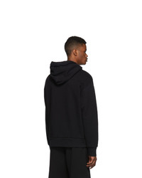 schwarzer und weißer bedruckter Pullover mit einem Kapuze von Gucci
