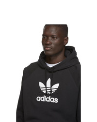 schwarzer und weißer bedruckter Pullover mit einem Kapuze von adidas Originals