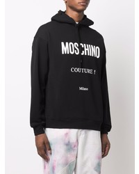 schwarzer und weißer bedruckter Pullover mit einem Kapuze von Moschino