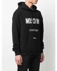 schwarzer und weißer bedruckter Pullover mit einem Kapuze von Moschino