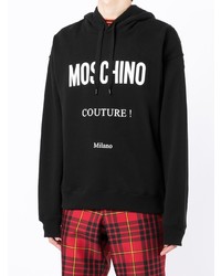 schwarzer und weißer bedruckter Pullover mit einem Kapuze von Moschino