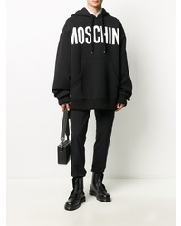 schwarzer und weißer bedruckter Pullover mit einem Kapuze von Moschino