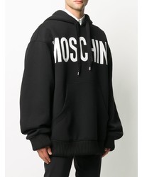 schwarzer und weißer bedruckter Pullover mit einem Kapuze von Moschino