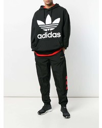 schwarzer und weißer bedruckter Pullover mit einem Kapuze von adidas