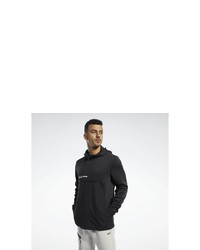 schwarzer und weißer bedruckter Pullover mit einem Kapuze von Reebok