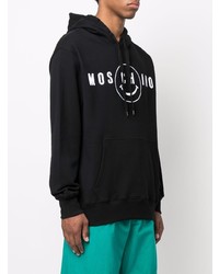 schwarzer und weißer bedruckter Pullover mit einem Kapuze von Moschino