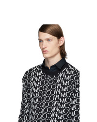 schwarzer und weißer bedruckter Pullover mit einem Rundhalsausschnitt von McQ Alexander McQueen