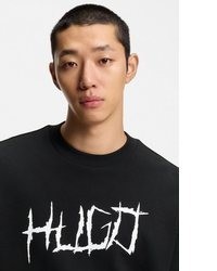 schwarzer und weißer bedruckter Pullover mit einem Rundhalsausschnitt von HUGO Blue