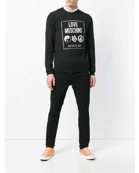 schwarzer und weißer bedruckter Pullover mit einem Rundhalsausschnitt von Love Moschino