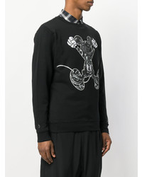 schwarzer und weißer bedruckter Pullover mit einem Rundhalsausschnitt von Marcelo Burlon County of Milan