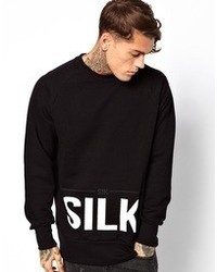 schwarzer und weißer bedruckter Pullover mit einem Rundhalsausschnitt von Siksilk